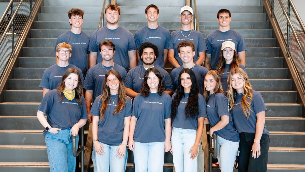 School of Ministry students smiling together on a staircase